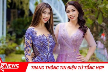 Lý Hương cùng con gái nắm tay nhau catwalk trong show Hoàng Hải